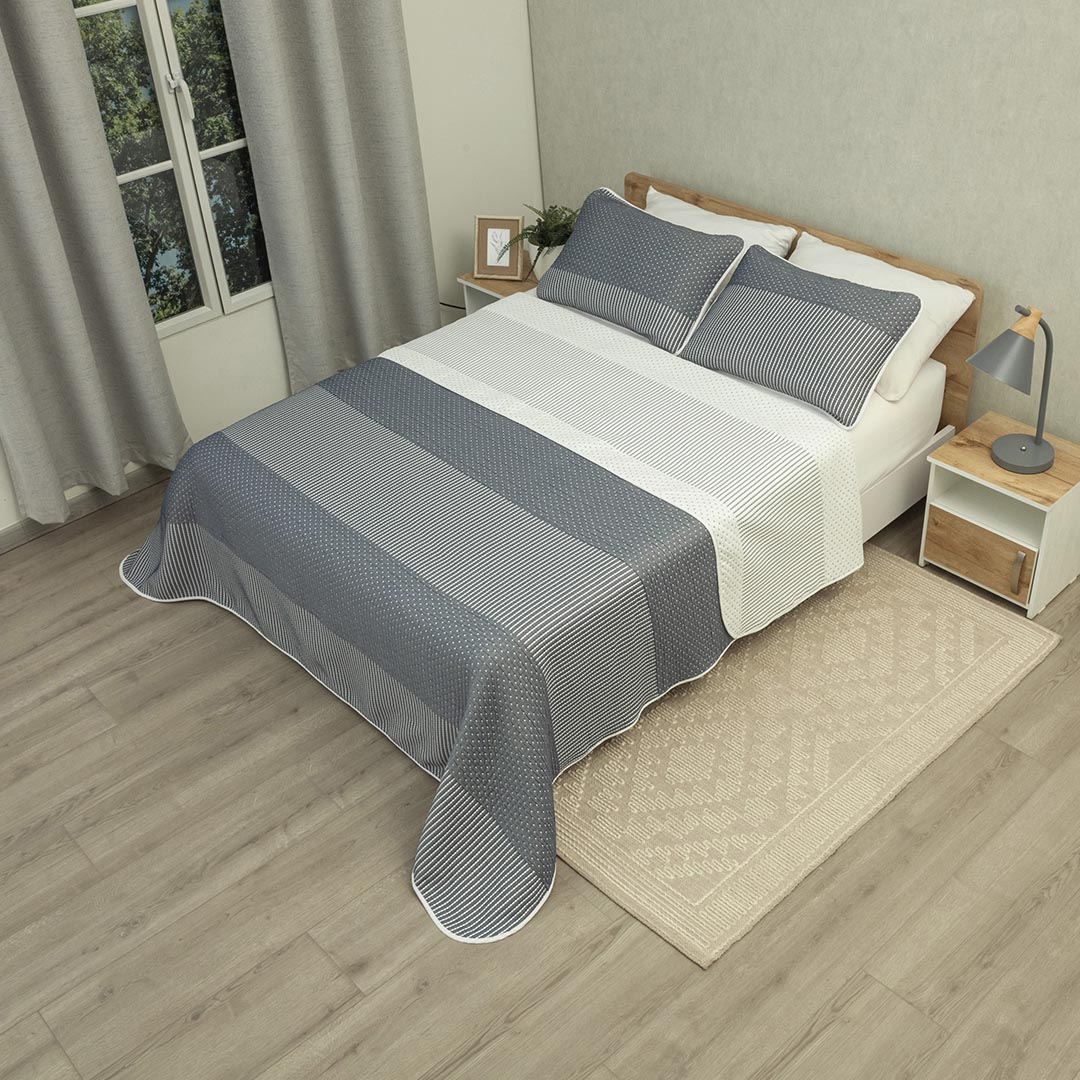 Cubrelecho Prensado Doble Faz Trama Puntos sobre Arena Azul